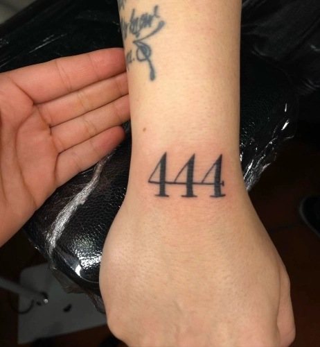 444 Numerology Symbol Tattoo