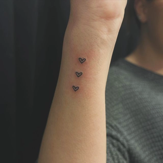 Cascading Heart Silhouette Tattoo