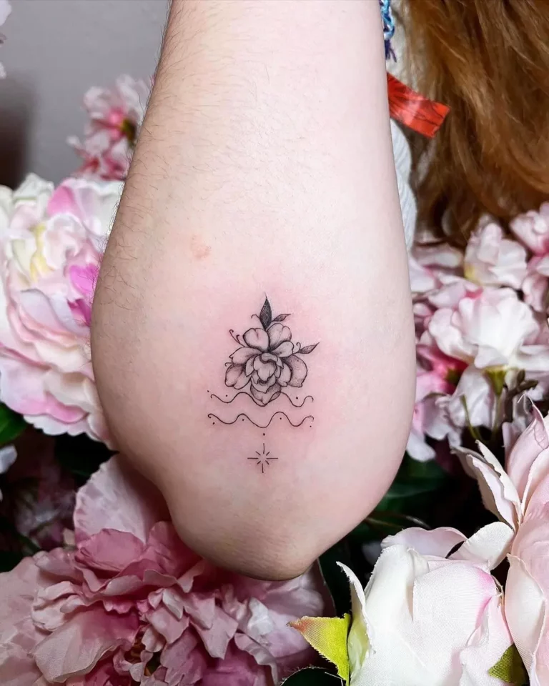 Energizing Floral Star Tattoo