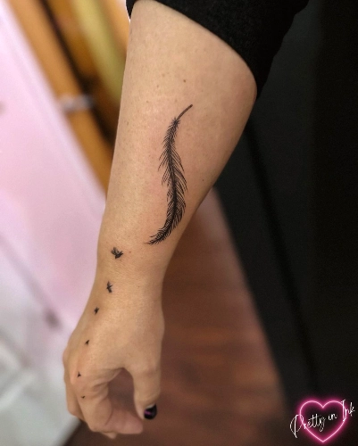 Ephemeral Feather Flight Tattoo
