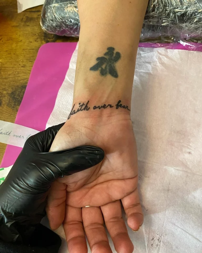 Faith Over Fear Script Tattoo