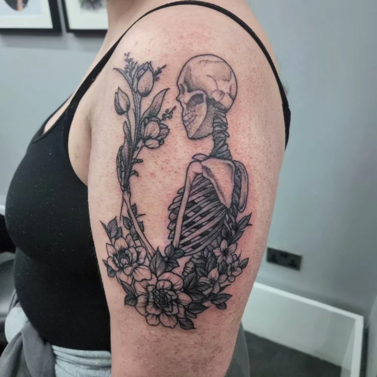 Floral Skeleton Self-Reflection Tattoo