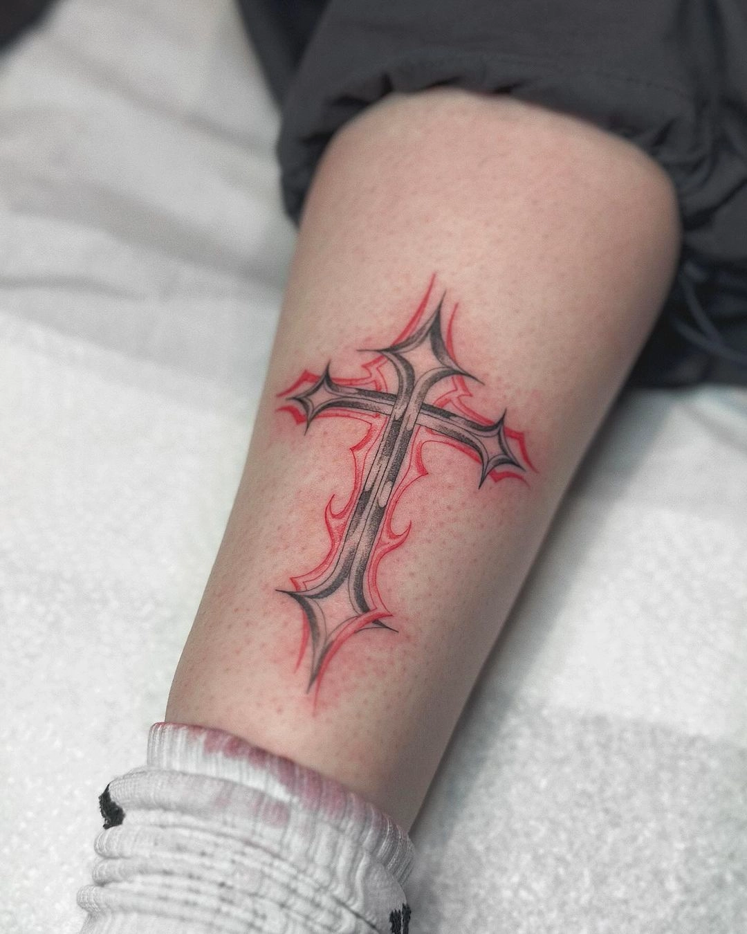 gothic cross strength tattoo