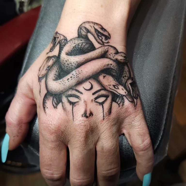 Intricate Serpentine Medusa Tattoo