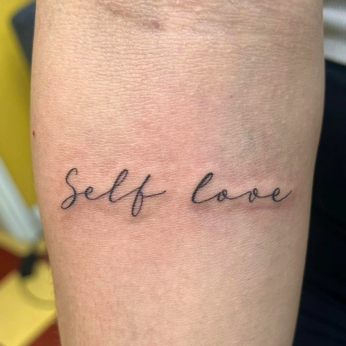 Minimalist 'Self Love' Wrist Tattoo
