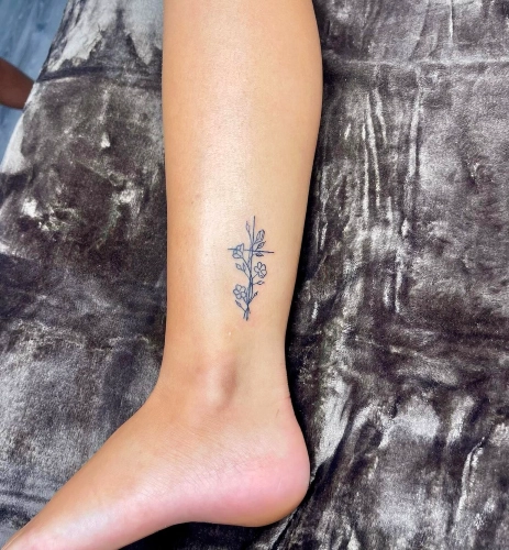 Petite Linework Flower Tattoo
