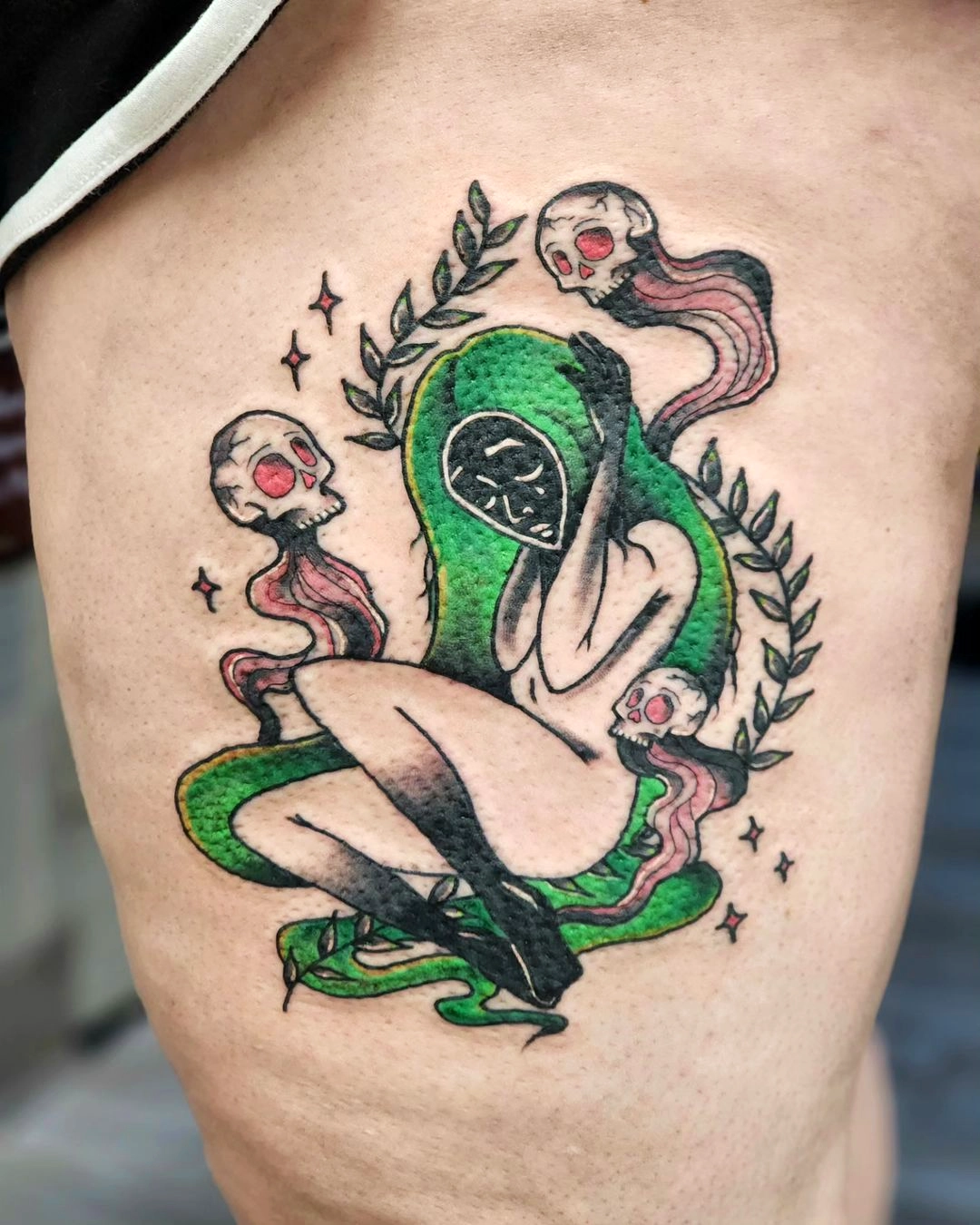 Serene Strength Skull Embrace Tattoo