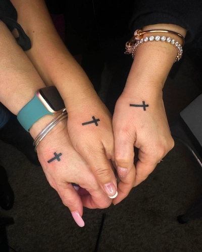 Simplistic Cross Wrist Tattoo