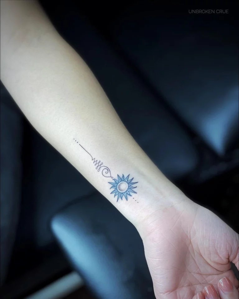 Sun Spiral Mental Awareness Tattoo